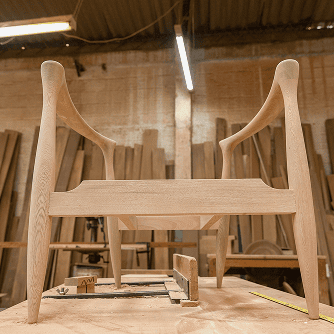 Custom chair being made in a wood shop from Hemlock lumber